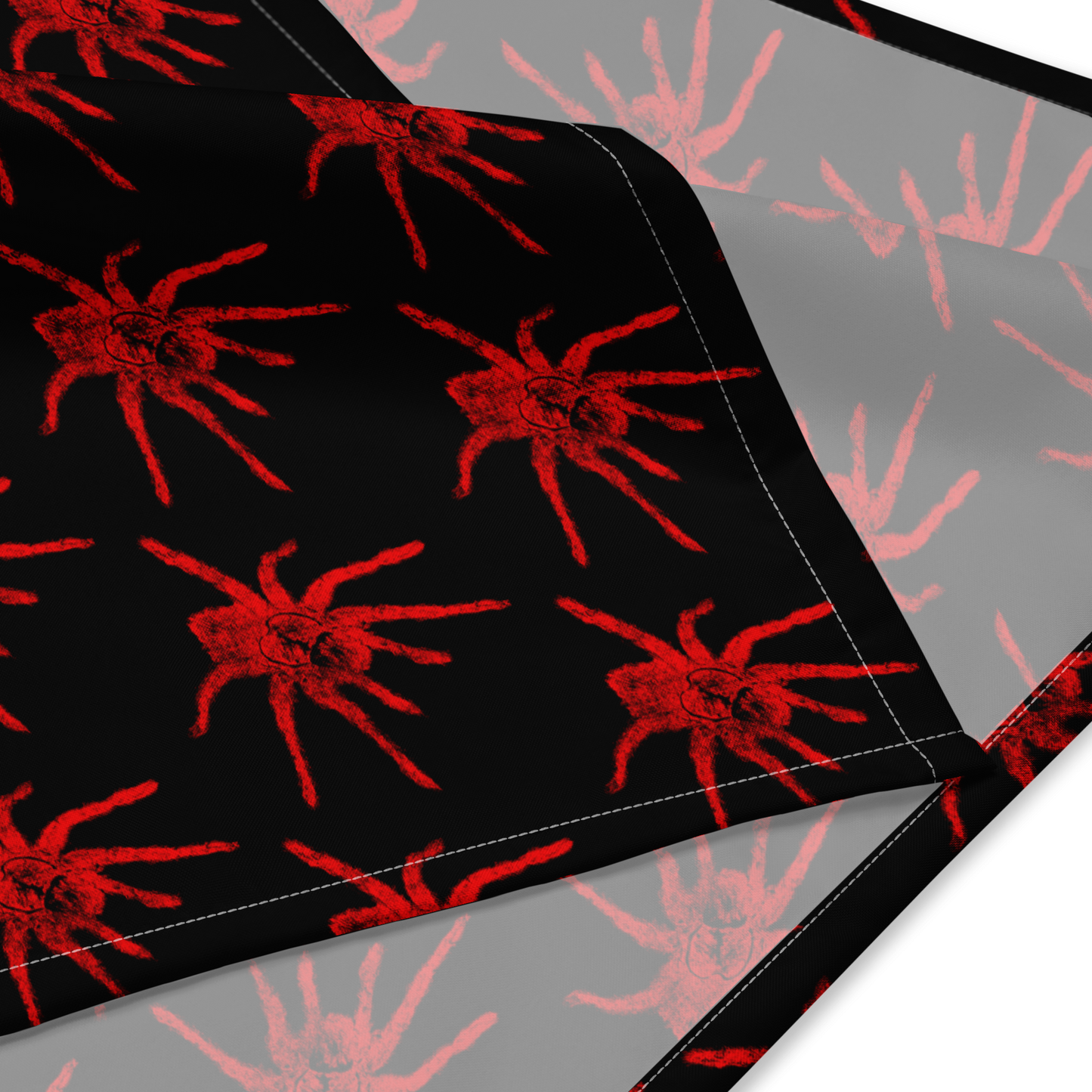 Red spider pattern on black and gray backgrounds