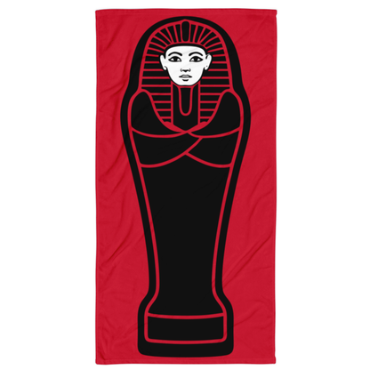 Red towel with black sarcophagus design on a white background