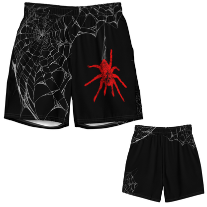 Black shorts with spider web design and red spider on a white background