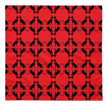 Pattern of black cats on a red background