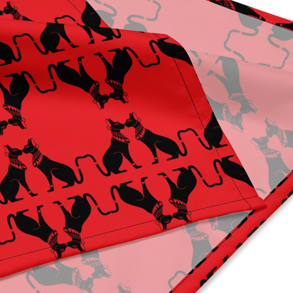 Red fabric with black cat pattern