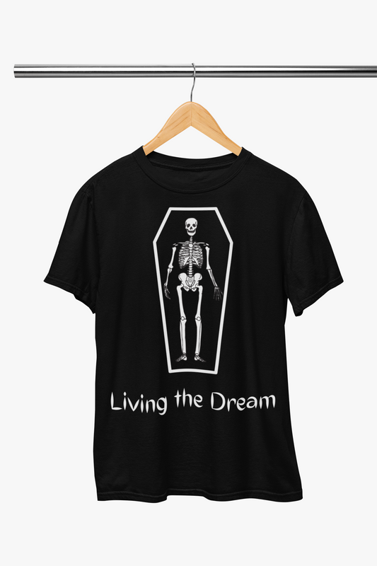 Black t-shirt with skeleton in coffin graphic and 'Living the Dream' text on a hanger.
